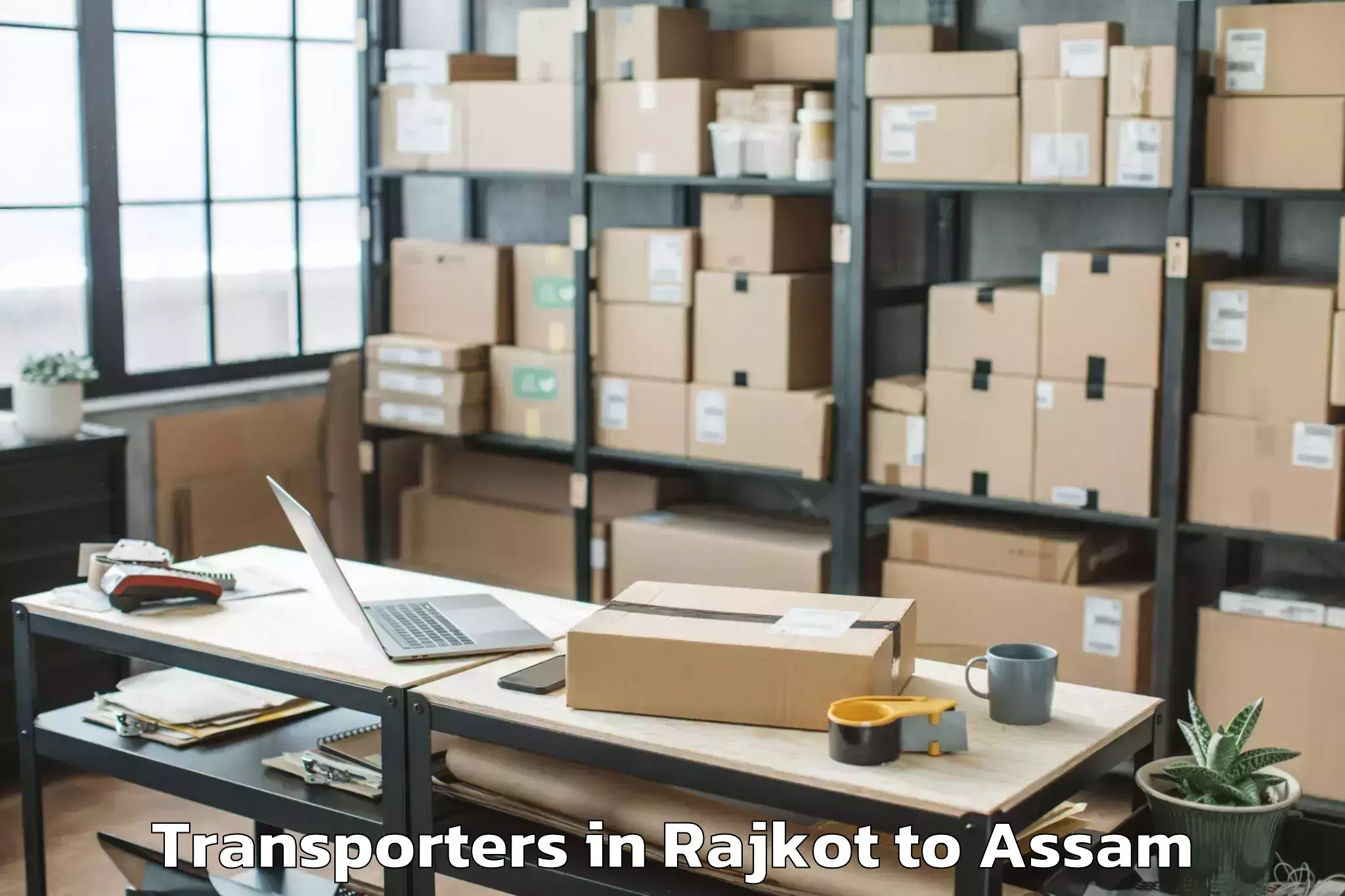 Book Rajkot to Baganpara Pt Transporters Online